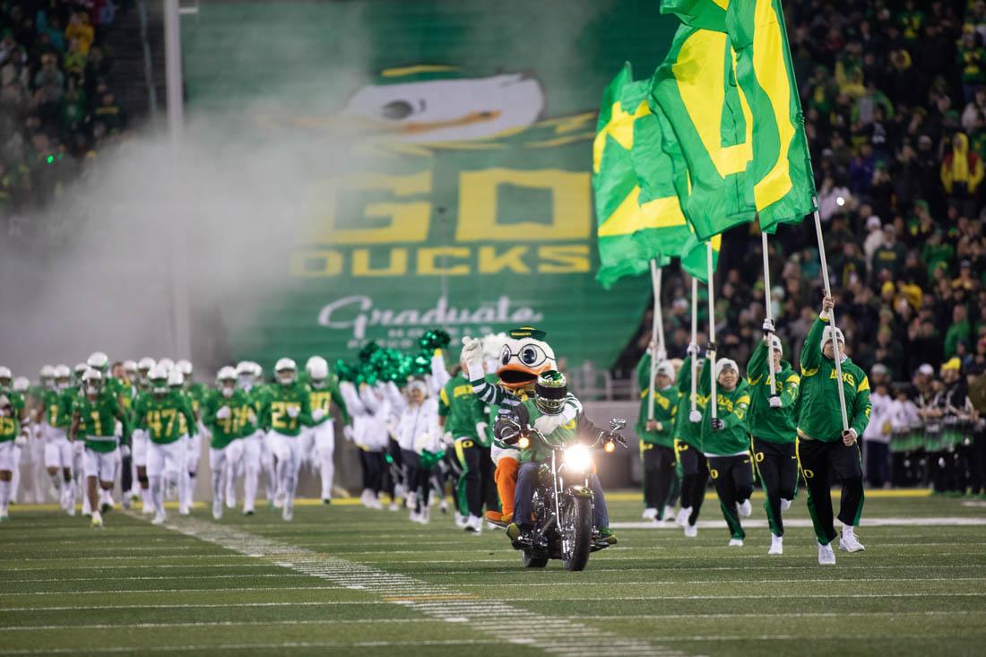 The Ducks come out with the rest of the UO football team prior to kickoff, in the final motorcycle ride tradition. The Oregon Ducks take on the University of Utah Utes at Autzen Stadium in Eugene, Ore., on Nov. 19, 2022 (Maddie Stellingwerf/Emerald)