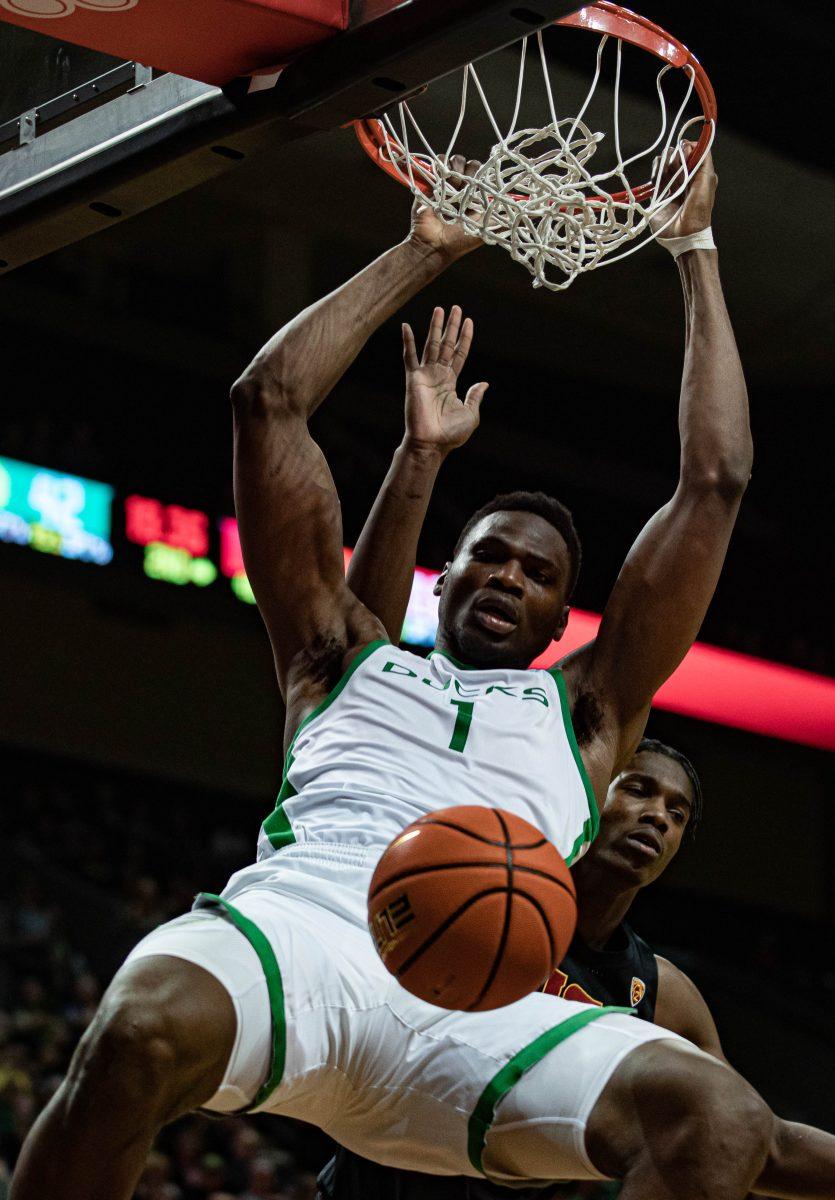 Oregon center N'Faly Dante slams home a dunk in the Ducks 78-60 win over the USC Trojans, on Thursday night. (Maddie Stellingwerf, Daily Emerald)