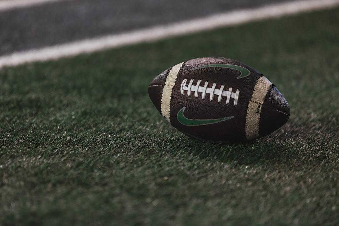 The balls used for the game are picked up around the field after warm ups concluded. The University of Oregon Ducks take on the Stanford Cardinal on Oct. 1, 2022 at Autzen Stadium in Eugene, Ore.(Maddie Stellingwerf/Emerald)