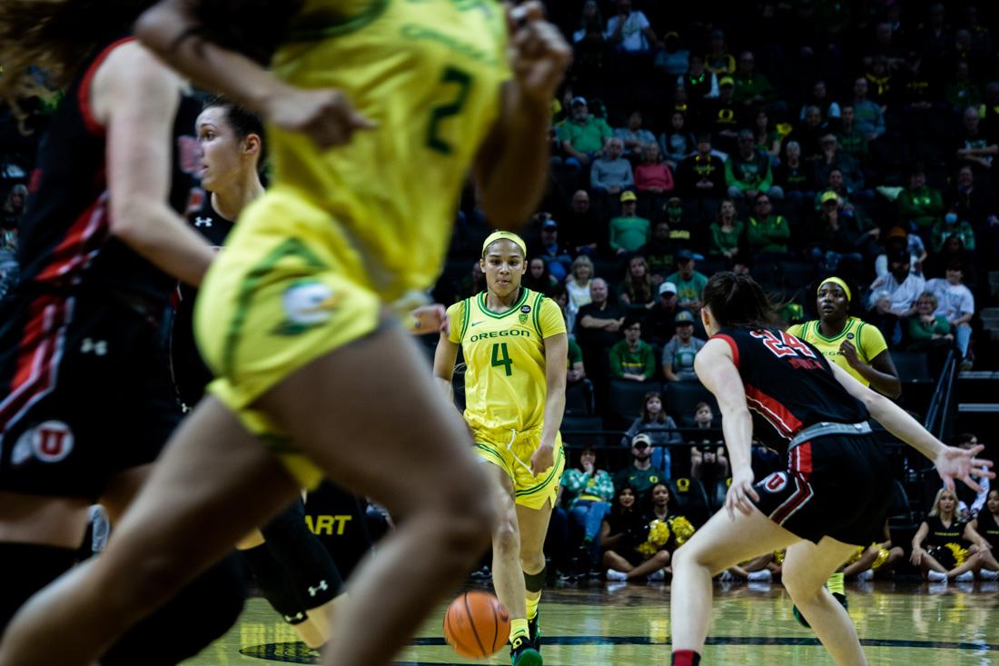 Ducks Endyia Rogers (4) moves the ball down court. The Oregon Ducks take on the Utah Utes in Eugene, Ore., on Feb. 5, 2023. (Ali Watson/Emerald)