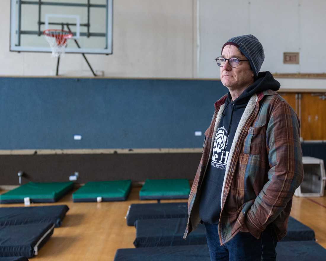 Tim Black, the Winter Strategies Coordinator at St. Vincent de Paul Society of Lane County, stands inside First United Methodist, Egan Youth Site. The site pictured is located on A St. in Springfield Ore. Egan Warming Centers serve as night shelters for houseless individuals; the centers are only open on nights projected to be below 30 F. (Molly McPherson/Emerald)