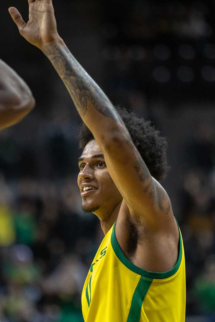 Rivaldo Soares (11) reaches for a high-five from his teammate. The Oregon Ducks Men&#8217;s Basketball team takes on the Stanford Cardinal at Matthew Knight Arena in Eugene, Ore., on Mar. 4th, 2023 (Molly McPherson/Emerald)