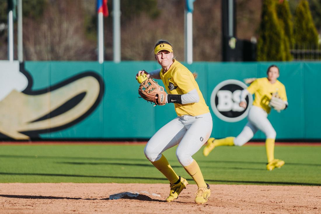 Allee Bunker gets set to throw to first base after making a ground ball stop at second base. The Oregon Ducks Softball team faces the Portland State Vikings, on March 11th, 2022, at Jane Sanders Stadium. (Serei Hendrie/Emerald)