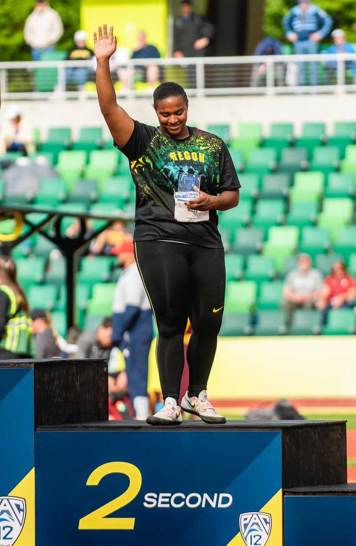 Oregon&#8217;s Jaida Ross waves to the coward after placing second overall for the women&#8217;s shot put. The second day of the 2022 PAC-12 Track &amp; Field Championships took place at Hayward Field in Eugene, Ore., on May 14th, 2022. (Ian Enger/ Emerald)