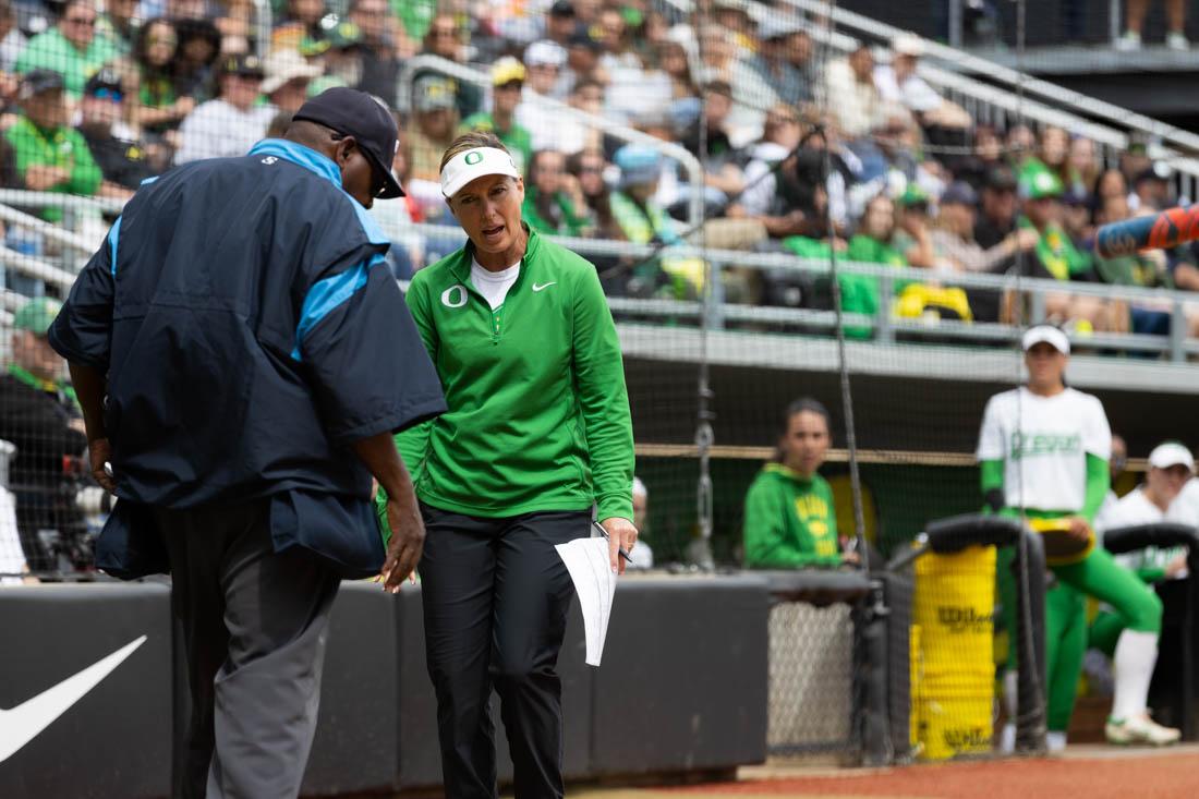 Head coach Melyssa Lombardi questions a previous call made by the umpire. Oregon Ducks softball lost 0-2 in a league series against the Utah Utes on May 7th, 2023, at Jane Sanders Stadium. (Kemper Flood/ Emerald).