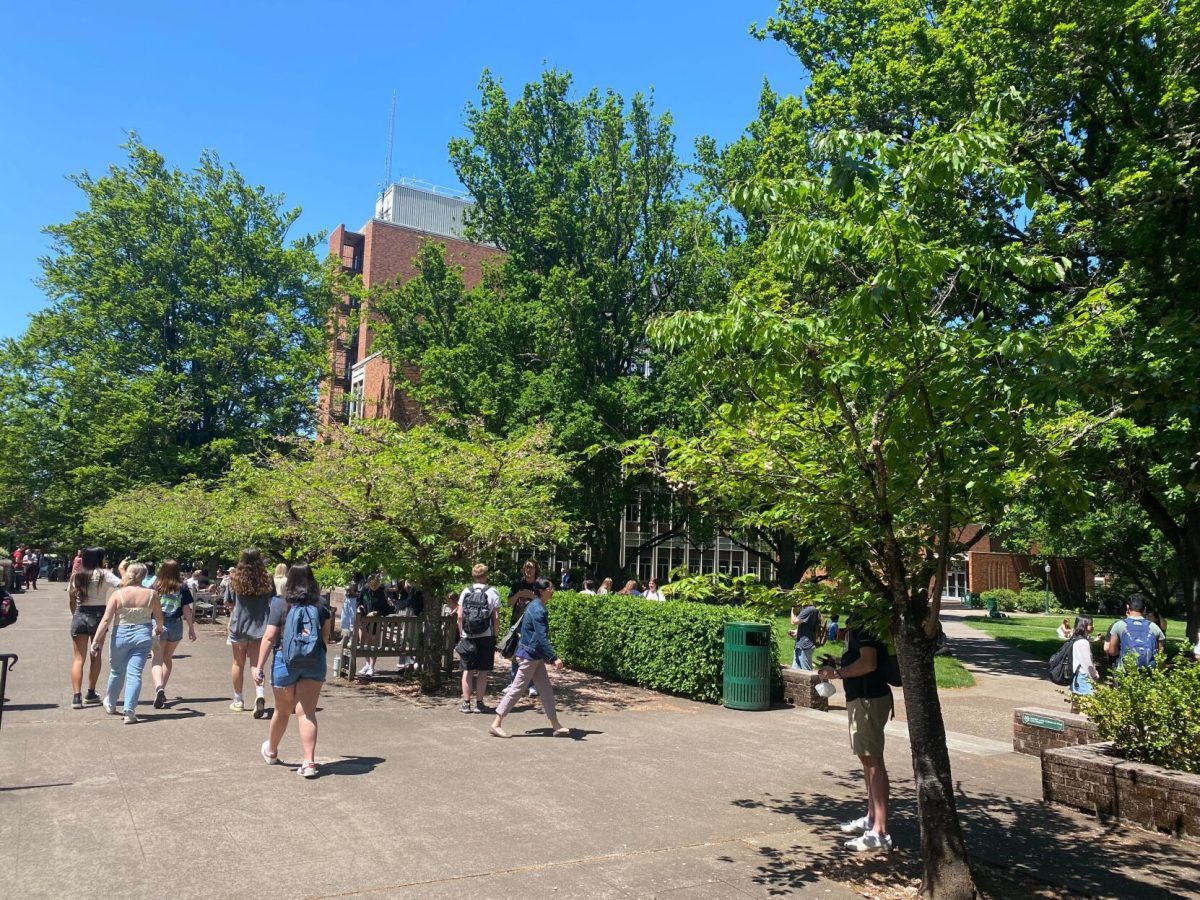 People evacuate from Knight Library after a fire alarm went off (Reilly Norgren).