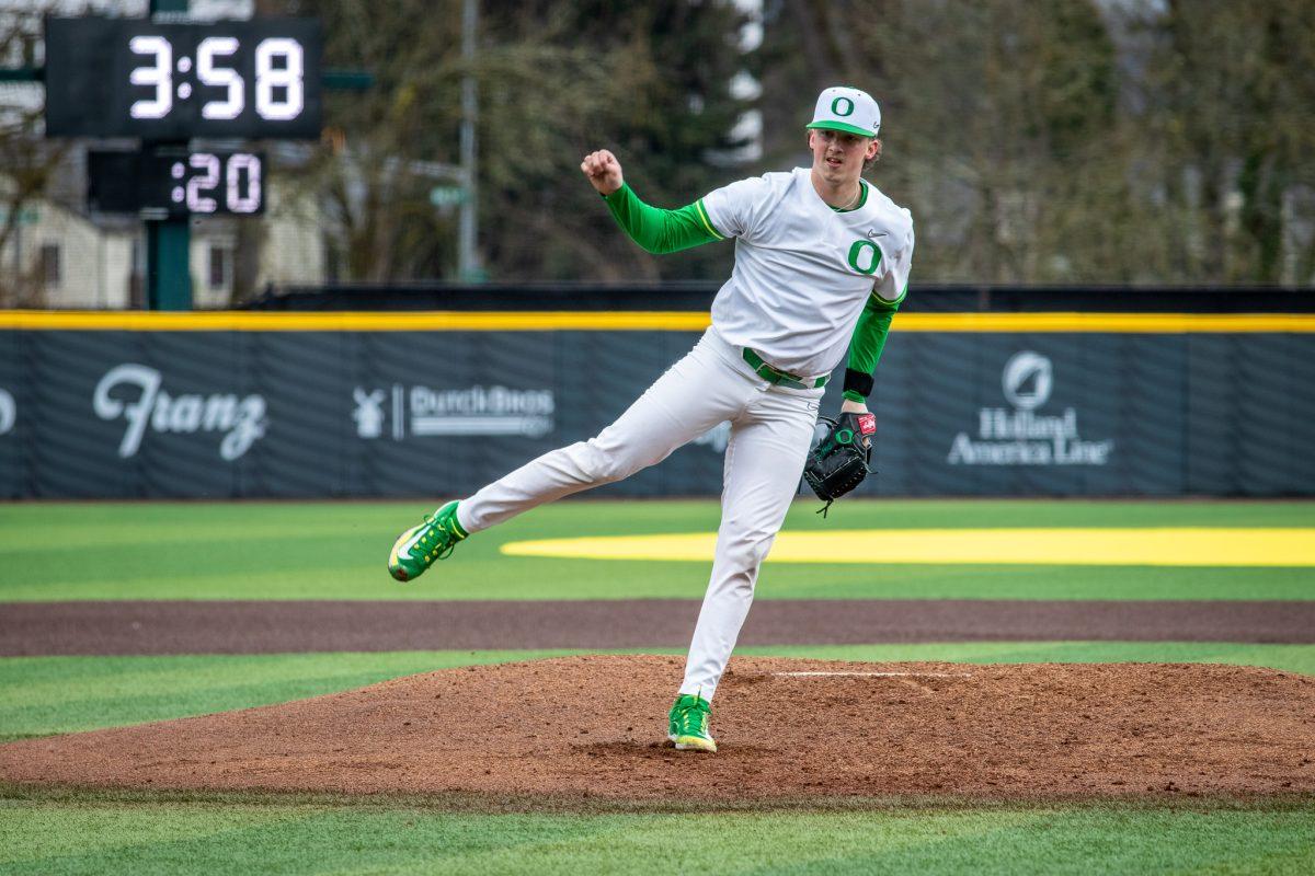 Jace Stoffal (9) watches his pitch fly towards home plate.&#160;The Oregon Baseball team begins PAC play for the 2023 season by hosting UCLA on March 10th at PK Park. (Jonathan Suni, Emerald)