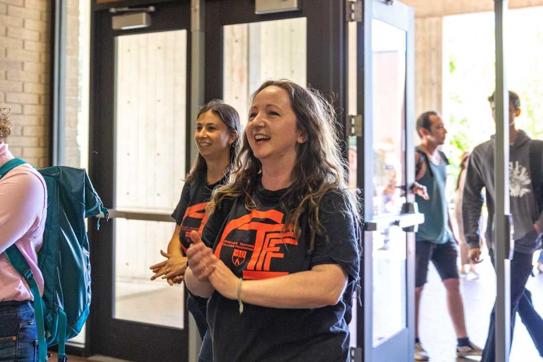 Rally attendees enter McKenzie Hall to begin their bargaining session. Members of Oregon&#8217;s Graduate Workers Union rallied with community members outside of McKenzie Hall ahead of their next bargaining session on June 2, 2023. (Molly McPherson/Emerald)