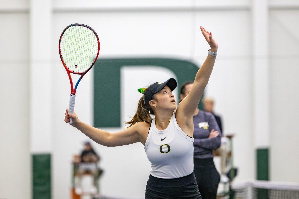 Freshman Jo-Yee Chan readies herself for a serve in the Student Tennis Center at the University of Oregon. (Photo Credit: Molly McPherson)