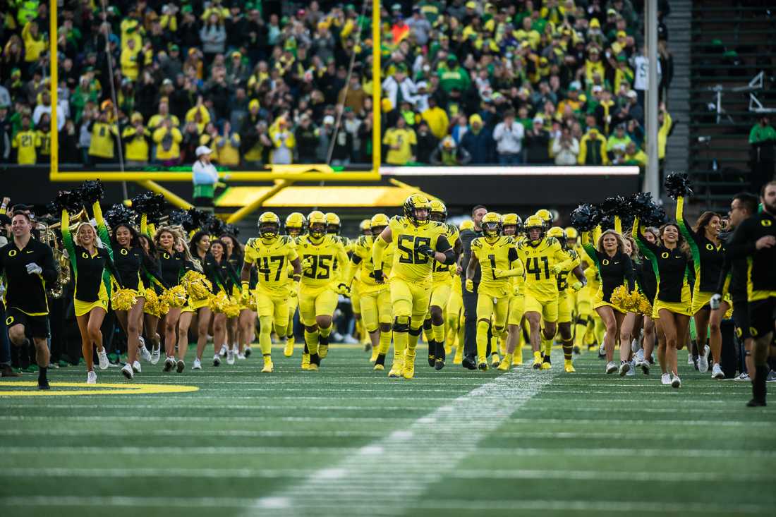 The Oregon Ducks run out the field in the start of game 10 of the 2022 season. The University of Oregon Ducks hosted the University of Washington Huskies at Autzen Stadium in Eugene, Ore., on November 12th, 2022 for game 10 of the 2022 season. (Ian Enger/Emerald)