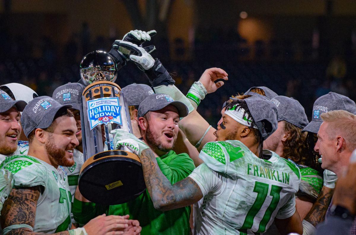 Head coach Dan Lanning celebrates with his team after winning the Holiday Bowl.&#160;The Oregon Ducks face the North Carolina Tar Heels in the annual Holiday Bowl at Petco Park in San Diego, CA, on December 28th, 2022. (Kai Kanzer/Emerald)