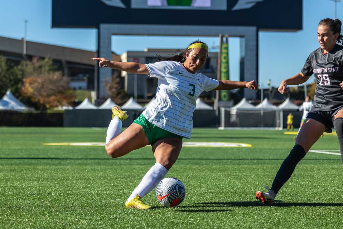 Oregon defender Anna Emperador (3) winds up to kick the ball. The Oregon Ducks women&#8217;s soccer team takes on the Washington State Cougars on Oct. 29, 2023, in Eugene, Ore. (Molly McPherson/Emerald)