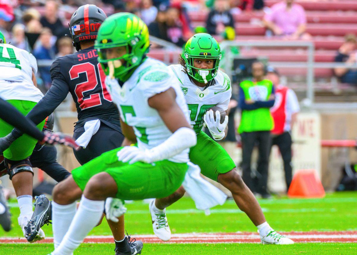 Jordan James (20) cuts to avoid a defender.&#160;The University of Oregon Ducks football team defeated the Stanford University Cardinals in an away match at Stanford Stadium in Stanford, Calif., on Sept. 30, 2023. (Eric Becker/Emerald)