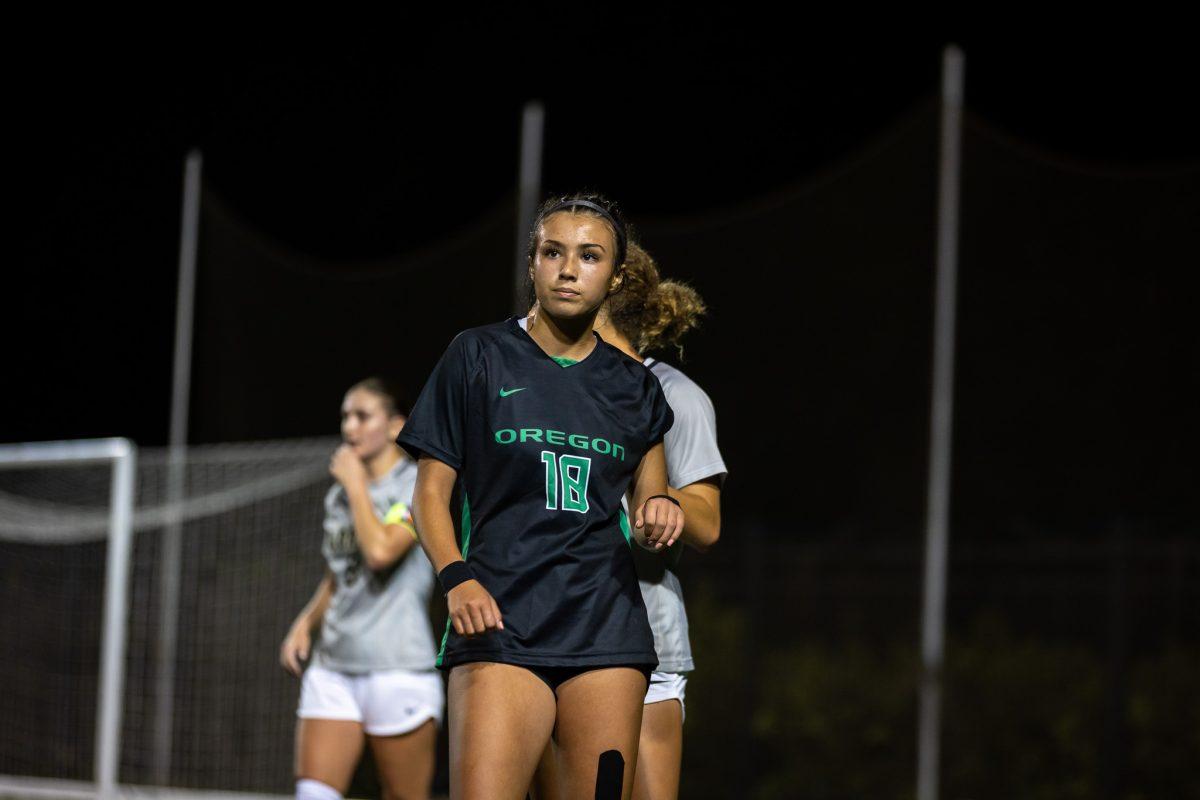 First-year Duck Lauren Kenny (18) pauses to gather herself after the Ducks lose possession in the offensive zone.&#160;The University of Oregon Ducks soccer team falls to the University of Colorado Buffalos with a score of 3-1 at&#160;Pape Field in Eugene, Ore., on Sept. 28, 2023. (Jonathan Suni/Emerald)