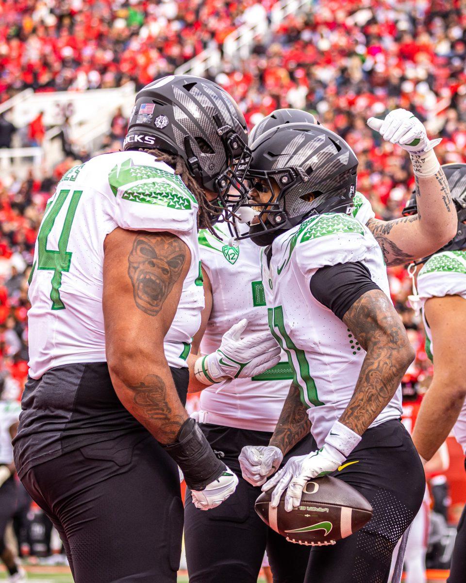 Troy Franklin celebrates with his teammates after scoring a touchdown adding to his stat-filled season.&#160;The No. 8 Oregon Ducks defeat the No. 12 Utah Utes 35-6 at Rice-Eccles Stadium in Salt Lake City, Utah, on Oct. 28, 2023. (Jonathan Suni/Emerald)