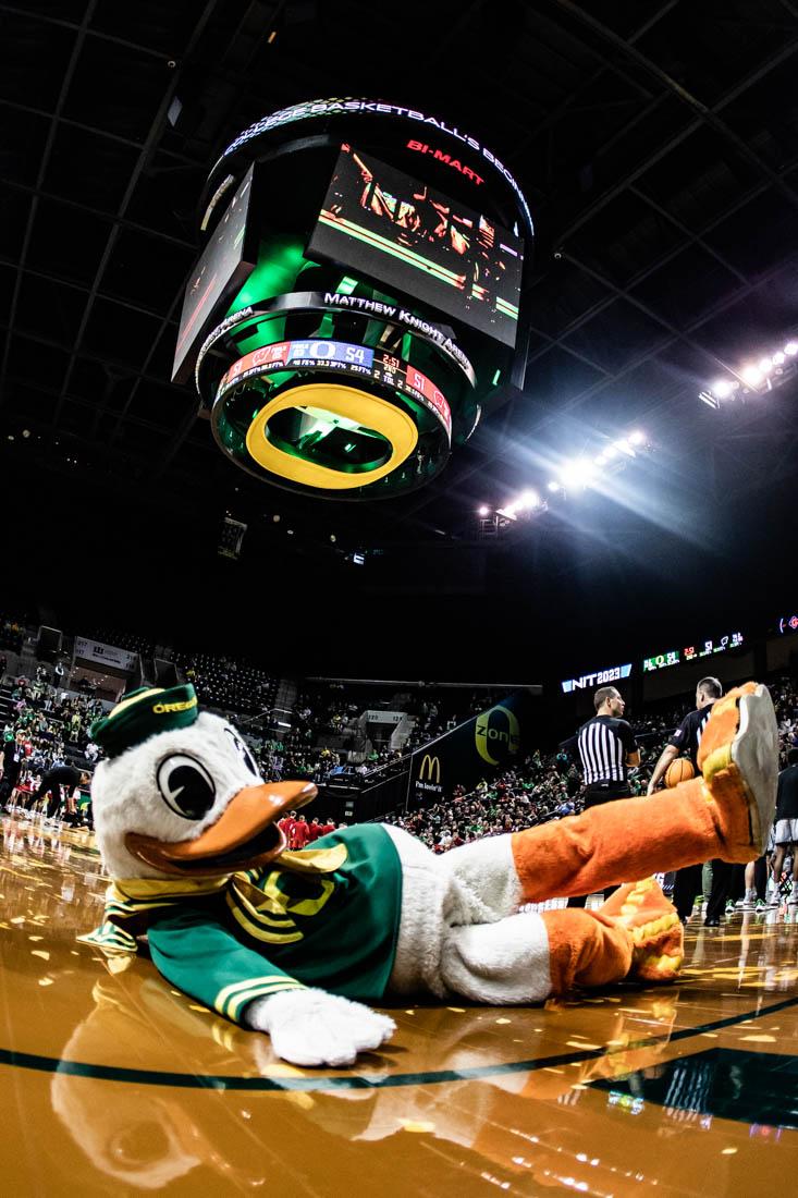 The Duck dances on the floor during "Shout." University of Oregon Mens Basketball take on the Wisconsin Badgers in round 3 of the National Invitational Tournament at Matthew Knight Arena in Eugene, Ore., on Mar. 21, 2023. (Maddie Stellingwerf/Emerald).