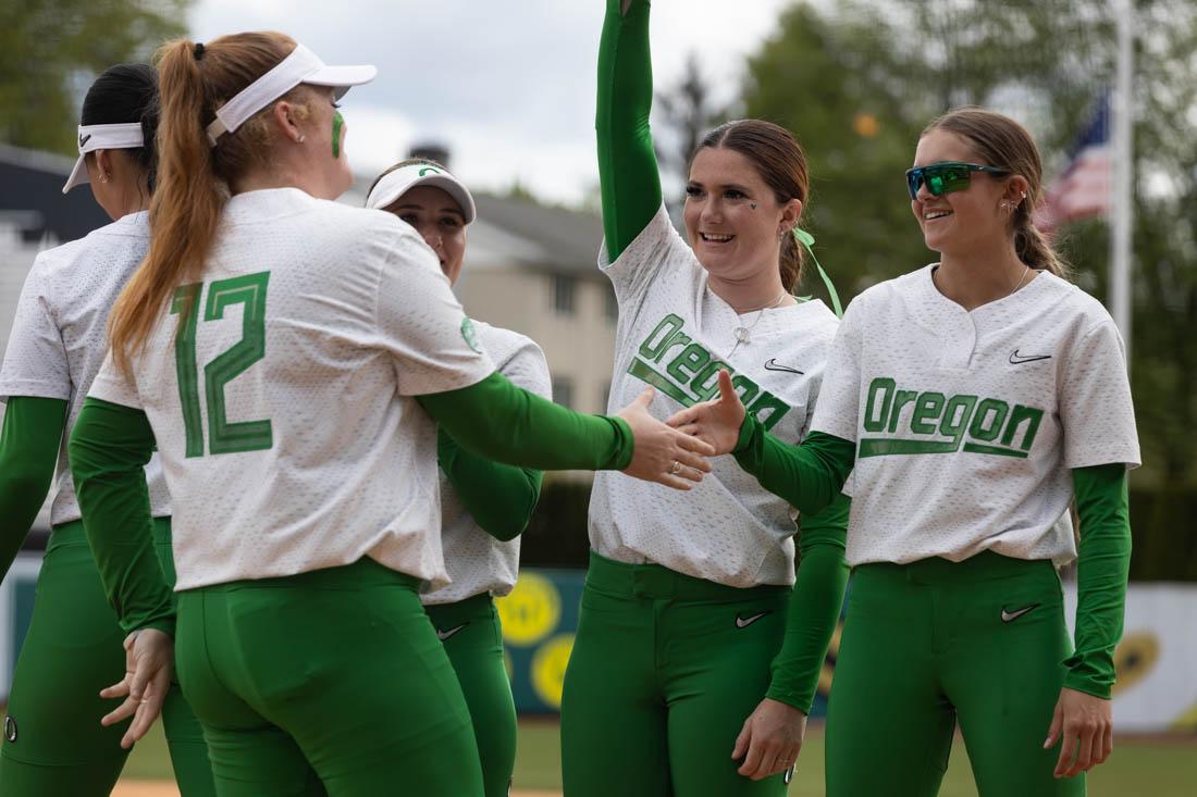 <p>Raegan Breedlove (12) goes down the line as the game lineup is announced. Oregon Ducks softball lost 0-2 in a league series against the Utah Utes on May 7th, 2023, at Jane Sanders Stadium. (Kemper Flood/ Emerald).</p>