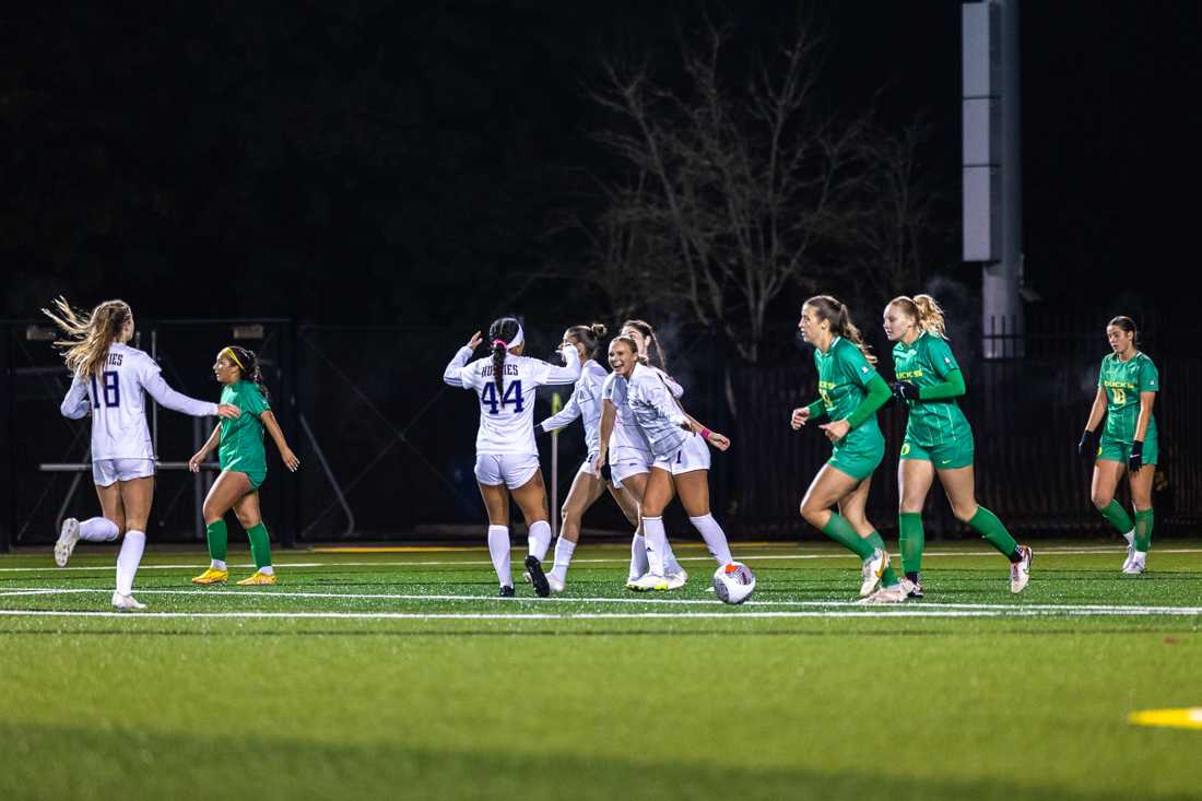 The Huskies celebrate following their one goal of the game. The Oregon Ducks women&#8217;s soccer team takes on the Washington Huskies on Oct. 26, 2023, in Eugene, Ore. (Molly McPherson/Emerald)