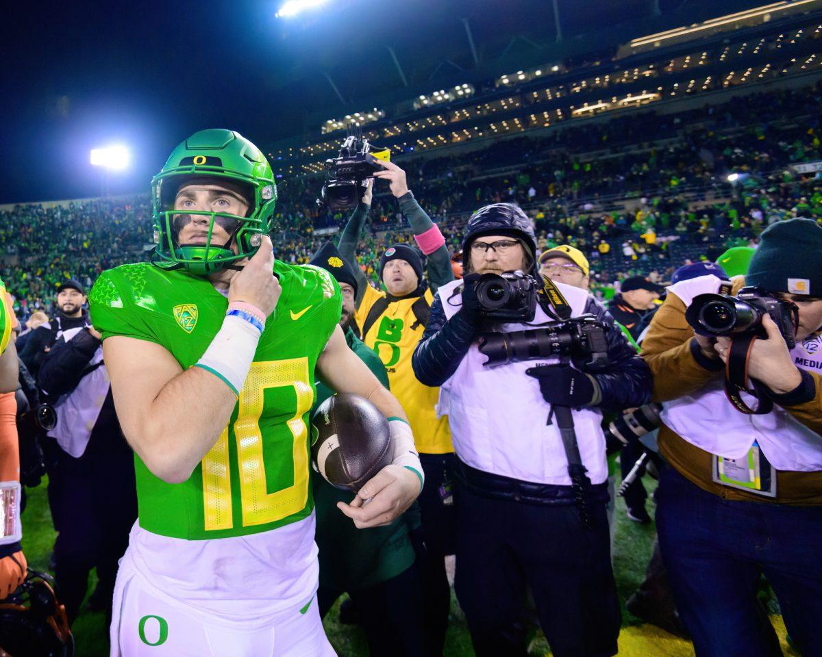 Oregon QB Bo Nix (10) walks off the field after the game. The University of Oregon Ducks Football team defeated Oregon State University 31-7 in a home match at Autzen Stadium in Eugene, Ore., on Nov. 24, 2023. (Eric Becker/Emerald)