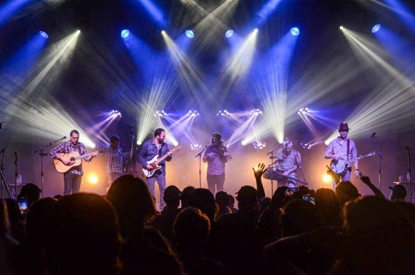 <p>Cris Jacobs comes out after opening to play with The Stringdusters. The Infamous Stringdusters perform at McDonald Theater in Eugene, Ore., on Nov. 9, 2023. (Kai Kanzer/ Emerald)</p>