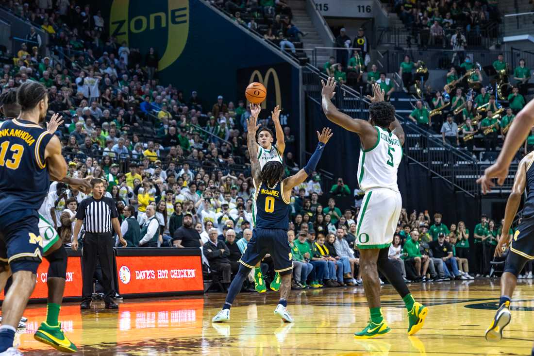 Jackson Sheldstad (3) fires off what would become the game-winning shot. The Oregon Ducks men&#8217;s basketball team takes on the Michigan Wolverines on Dec. 2, 2023 in Eugene, Ore. (Molly McPherson/Emerald)