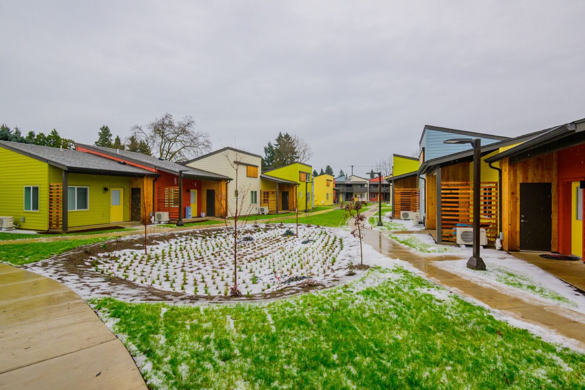 Colorful buildings provide the makeup of the Peace Village Co-Op, one of several affordable housing projects in Eugene, Ore., on Jan. 18, 2024. (Eric Becker/Emerald)