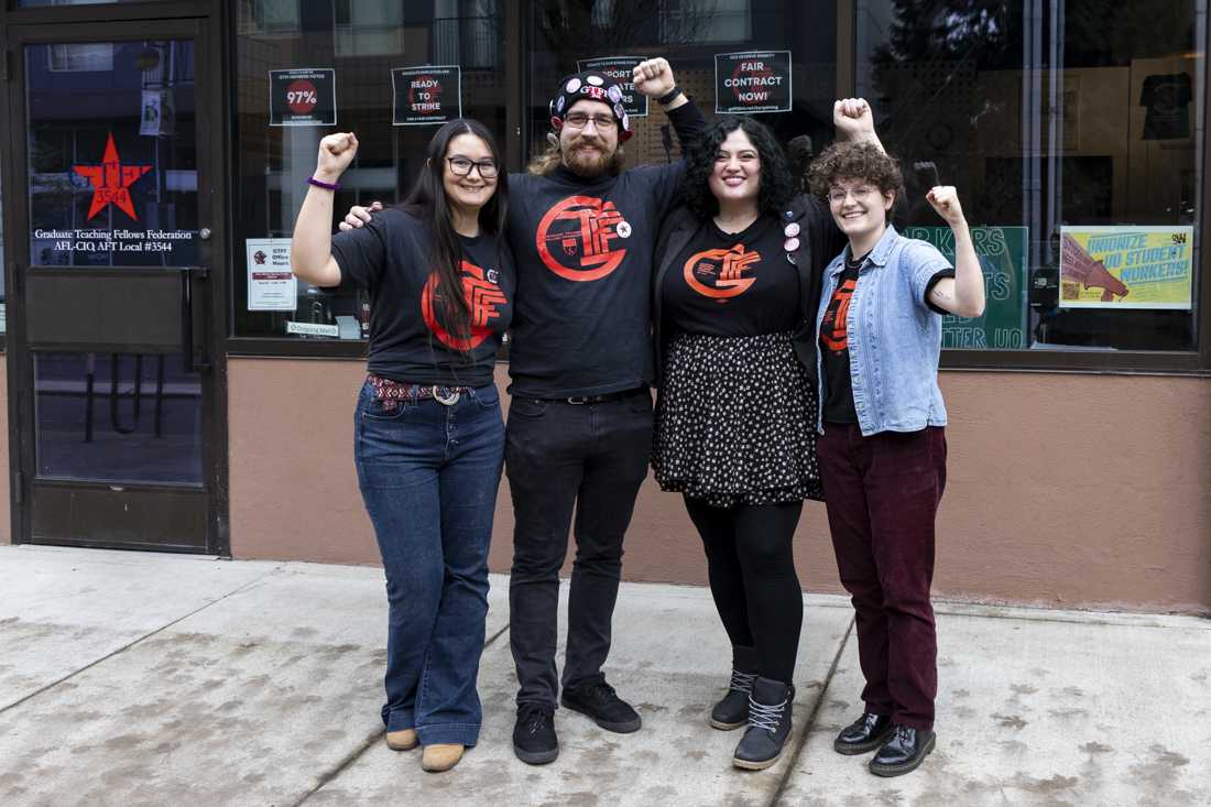 GTFF VP of Membership Lissie Connors, GTFF Bargaining Team member Ben Mannix, GTFF President Leslie Selcer and GTFF VP of Communications Rose Inocencio-Smith pose in front of the GTFF office on Nov. 29. (Alex Hernandez/Emerald)