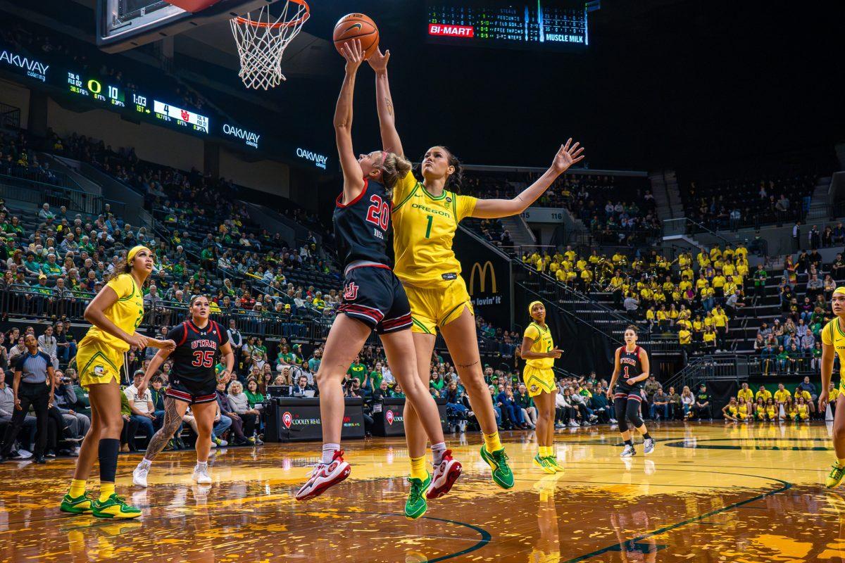 Kennedy Basham (1) blocking the shot. The University of Oregon Ducks Women&#8217;s Basketball Team played the University of Utah Utes in a home match at Matthew Knight Arena in Eugene, Ore., on Jan. 26, 2024. (Spencer So/Emerald)