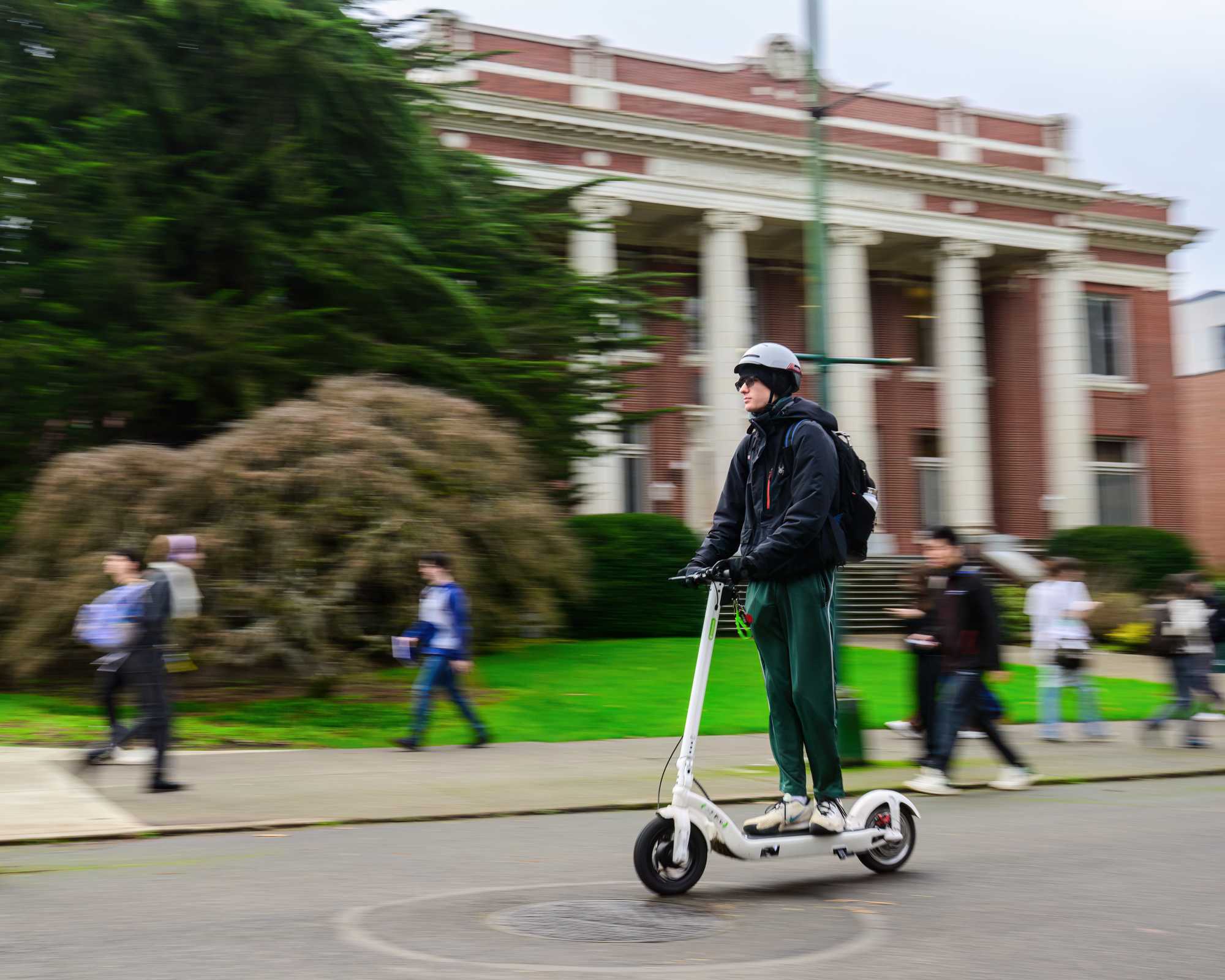 Electric scooters are a common sight around the grounds of the University of Oregon in Eugene, Ore., on Jan. 25, 2024. (Eric Becker/Emerald)