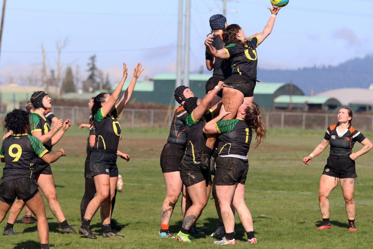 Em (Kitty) Fettel (8) seeking to win the line out so Oregon gains possession of the ball. The Oregon Rugby Club takes the victory over Oregon State 52-5 in their classic Civil War game at Agnes Stewart Middle School in Springfield, Ore., on Feb. 24, 2024. (Alyssa Garcia/Emerald)