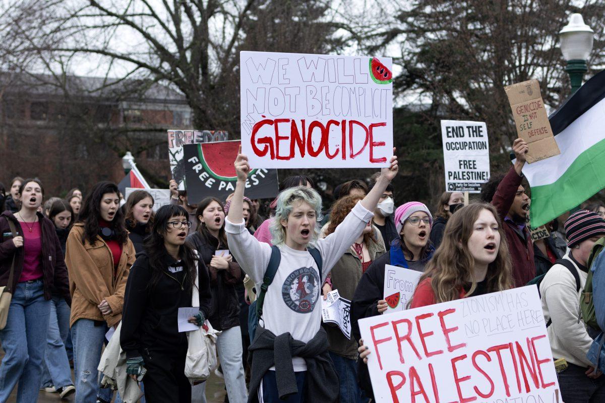 Students and community members march around the EMU carrying posters, flags and banners in support of Palestine. The rally, organized by Students for Justice in Palestine, focused on the recent Israeli attacks on the city of Rafah. (Colleen Bogdan/Emerald)