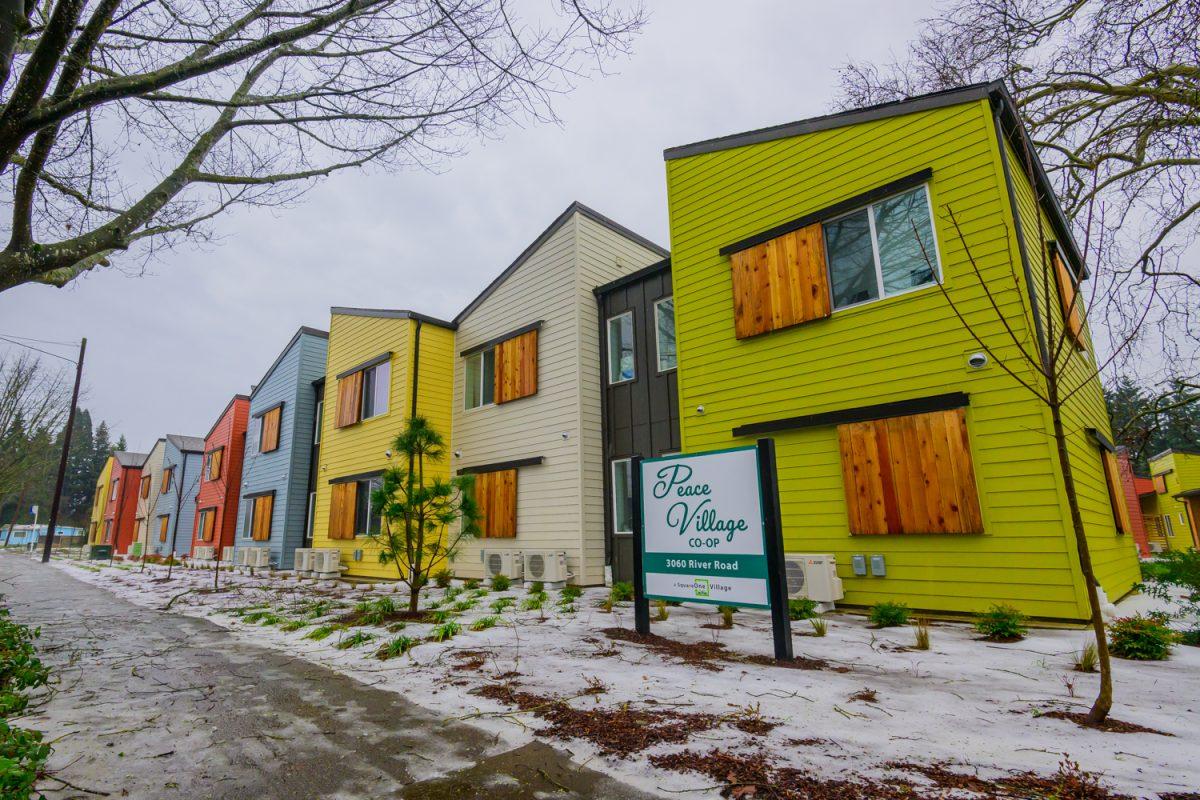 Colorful buildings provide the makeup of the Peace Village Co-Op, one of several affordable housing projects in Eugene, Ore., on Jan. 18, 2024. (Eric Becker/Emerald)