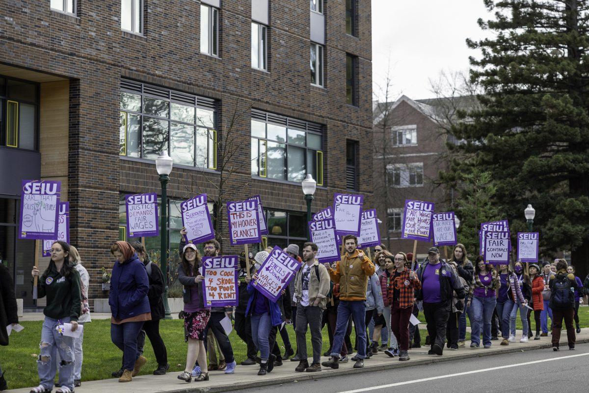 On Feb. 8, 2024, protestors gathered along Agate Street on the University of Oregon Campus to support SEIU&#8217;s bargaining for cost of living adjustments and other benefits. (Eliott Coda/E. Coda Media)