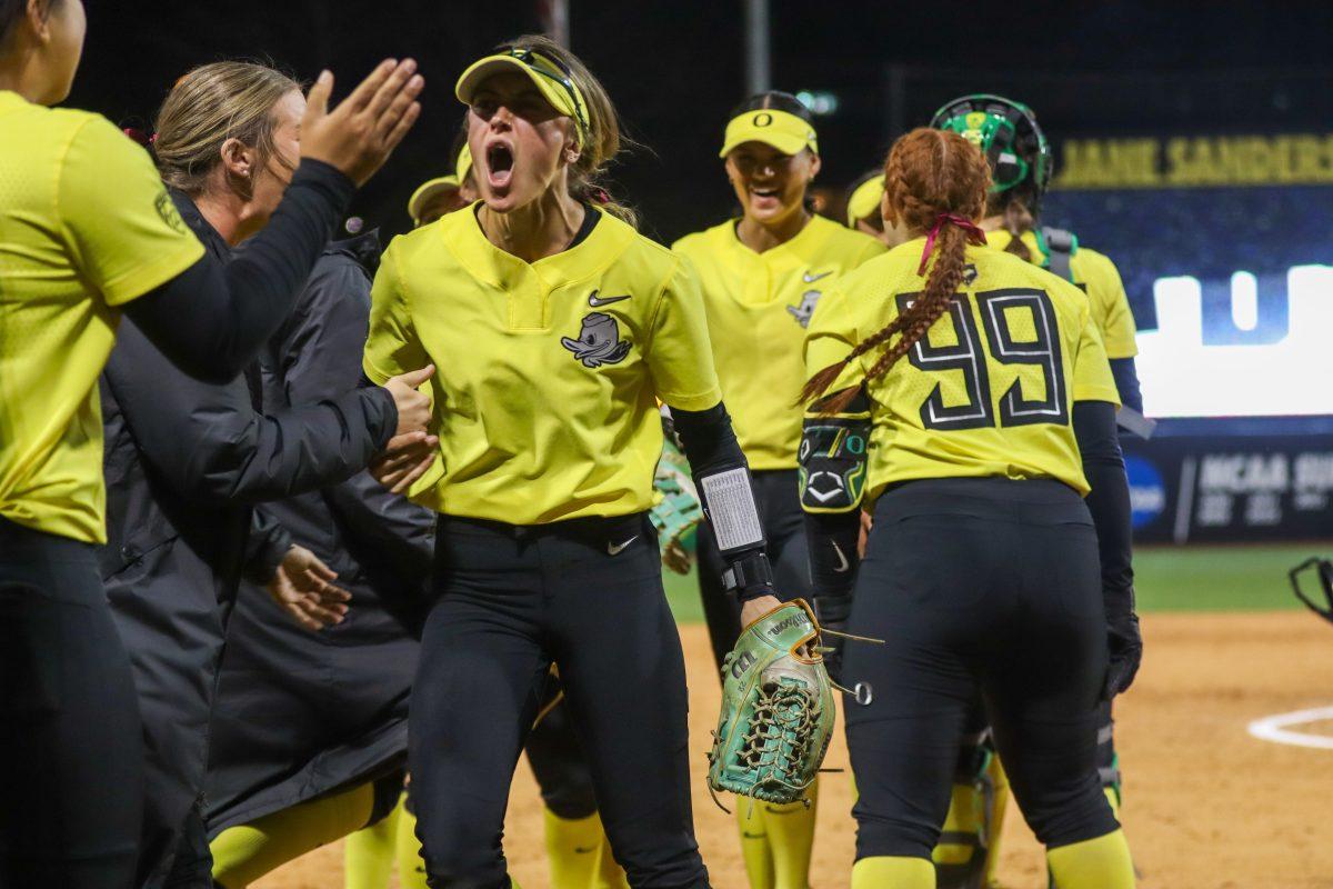 Kai Luschar (22) gets hyped up after getting a Cal runner out at home preventing Cal from scoring. The Oregon Softball team defeats California 4-3 in their second game against them in a doubleheader on March 8, 2024, in Eugene, Ore., at Jane Sanders Stadium. (Alyssa Garcia/Emerald)