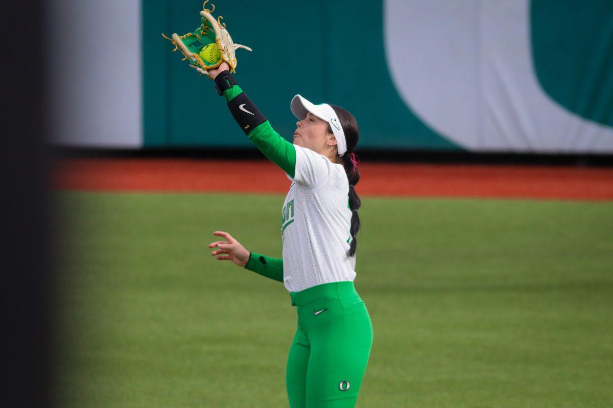 <p>Ariel Carlson (3) catches a pop fly. The Oregon Softball team came out on top in their second game against Maryland 4-2 in the Jane Sanders Classic hosted in Eugene, Ore., on March 2, 2024, at Jane Sanders Stadium. (Alyssa Garcia/Emerald)</p>