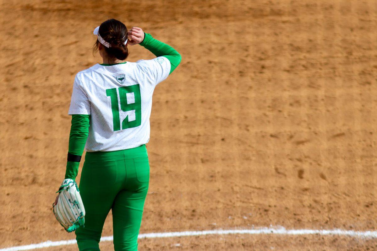 Taylour Spencer (19) waiting for the next inning to begin. The Oregon Softball team came out on top in their second game against Maryland 4-2 in the Jane Sanders Classic hosted in Eugene, Ore., on March 2, 2024, at Jane Sanders Stadium. (Alyssa Garcia/Emerald)