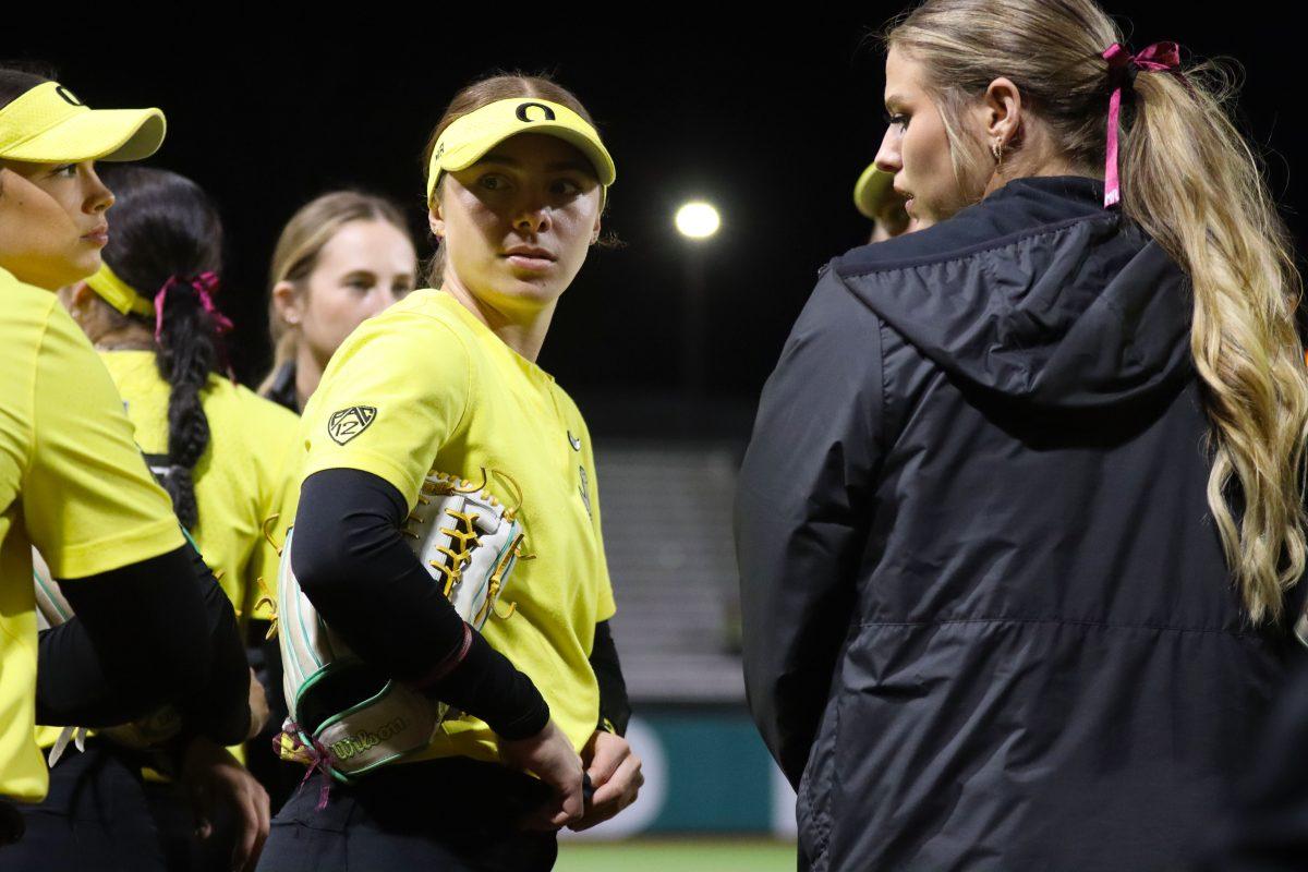 Hanna Delgado (24) looks back into the Oregon dugout. The Oregon Softball team defeats California 4-3 in their second game against them in a doubleheader on March 8, 2024, in Eugene, Ore., at Jane Sanders Stadium. (Alyssa Garcia/Emerald)