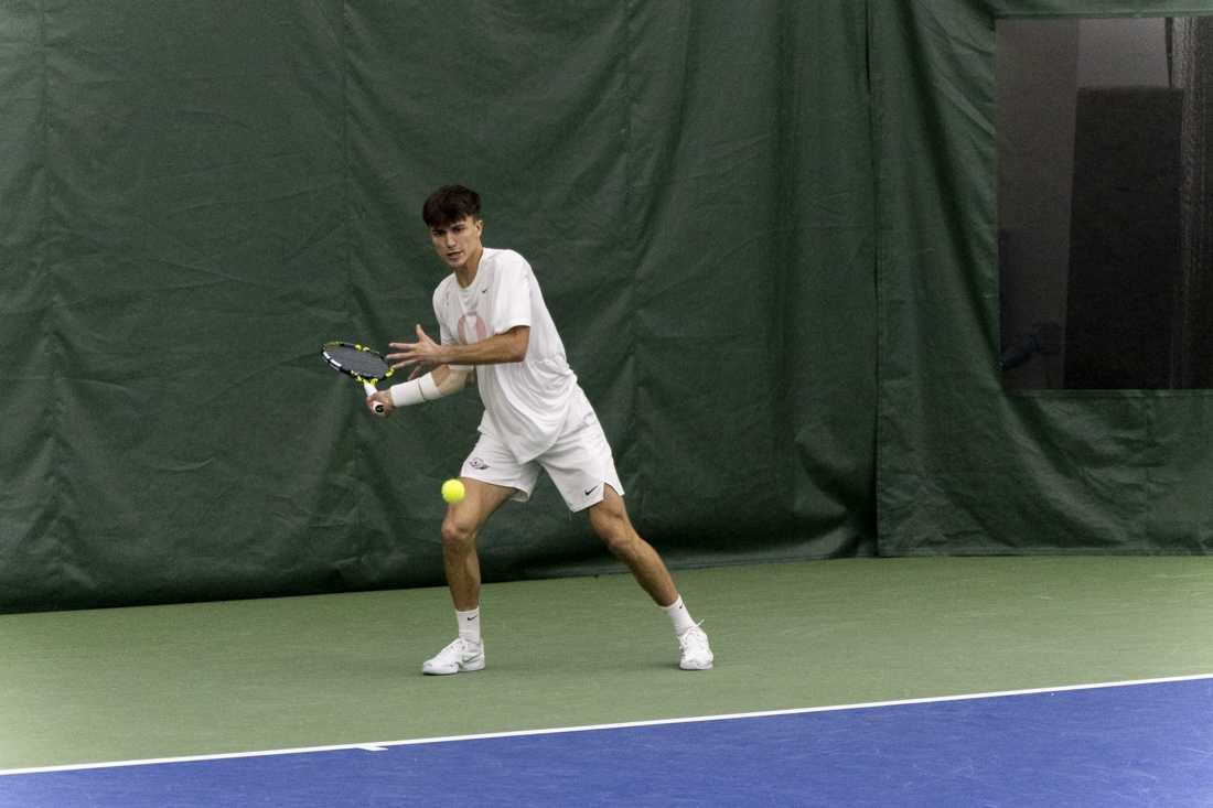 Quinn Vandecasteele returns the ball during a match on Feb. 10, 2024, as the Oregon men's tennis team faced off against the University of Nevada, Reno. (Alex Hernandez/Emerald)