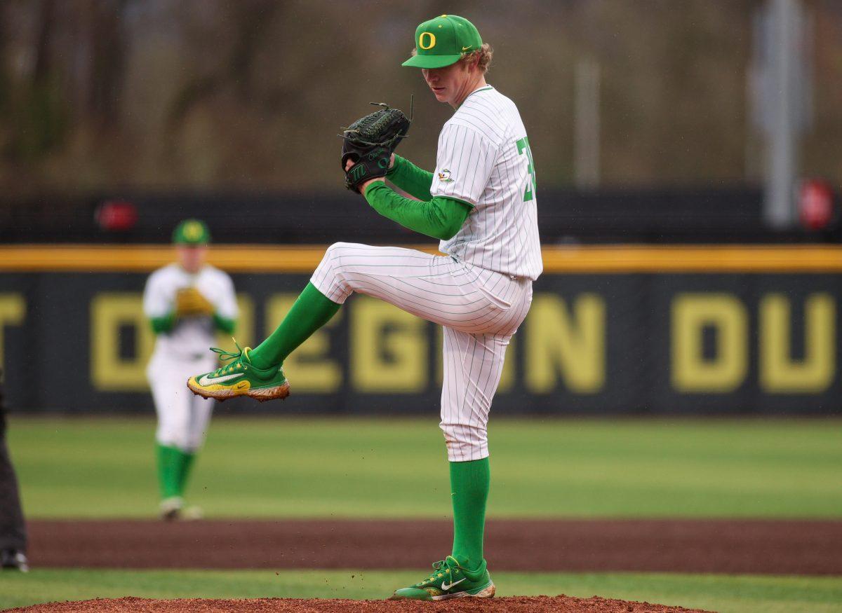 Collin Clarke (38) winds up to deliver a pitch. Oregon Baseball take on UC Santa Barbara at PK Park in Eugene, on March 3 , 2024. (Eddie Bruning/Emerald)