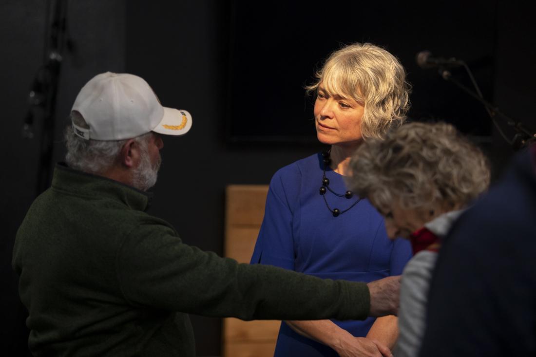 Kaarin Knudson, a mayoral candidate, speaks with community members who attended the mayoral candidate forum at Harvest Community Church on April 16, 2024. The forum, where candidates spoke about topics such as taxation, addiction and mental health crises in Eugene, and the recent HB4002, was organized by the Cal Young Neighborhood Association and Northeast Neighbors. (Alex Hernandez/Emerald)