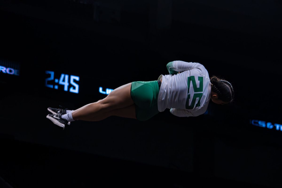 The University of Oregon Ducks Acrobatics and Tumbling Team played the University of Baylor Bears in a home match at Matthew Knight Arena in Eugene, Ore., on Apr. 5, 2024. (Spencer So/Emerald)
