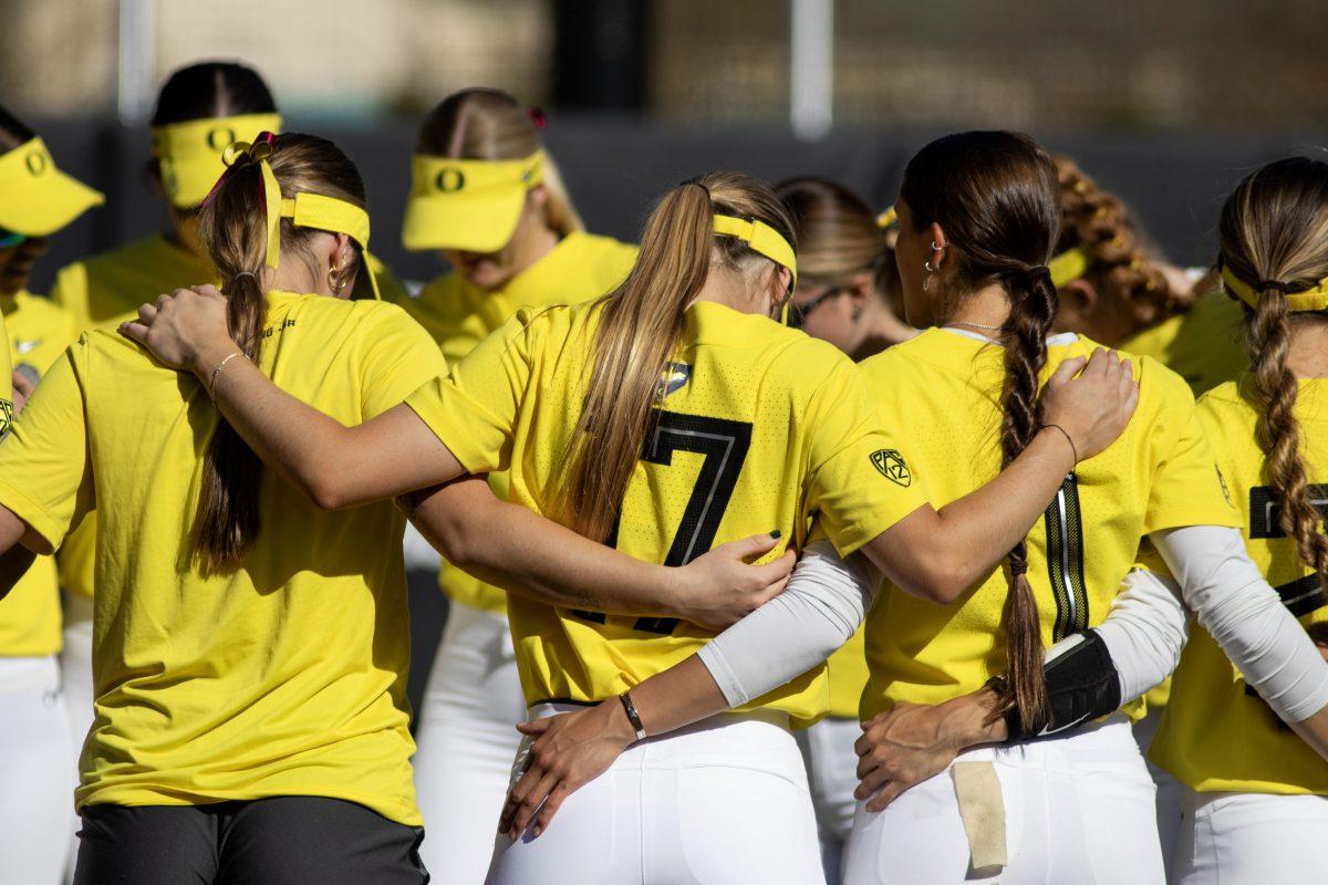 The Oregon Softball team prepares for their match. The Oregon Softball team secures the win 11-3 over Oregon State in game 1 of their Rivalry Series, hosted at Jane Sanders Stadium in Eugene, Ore., on April 19, 2024. (Alyssa Garcia/Emerald)