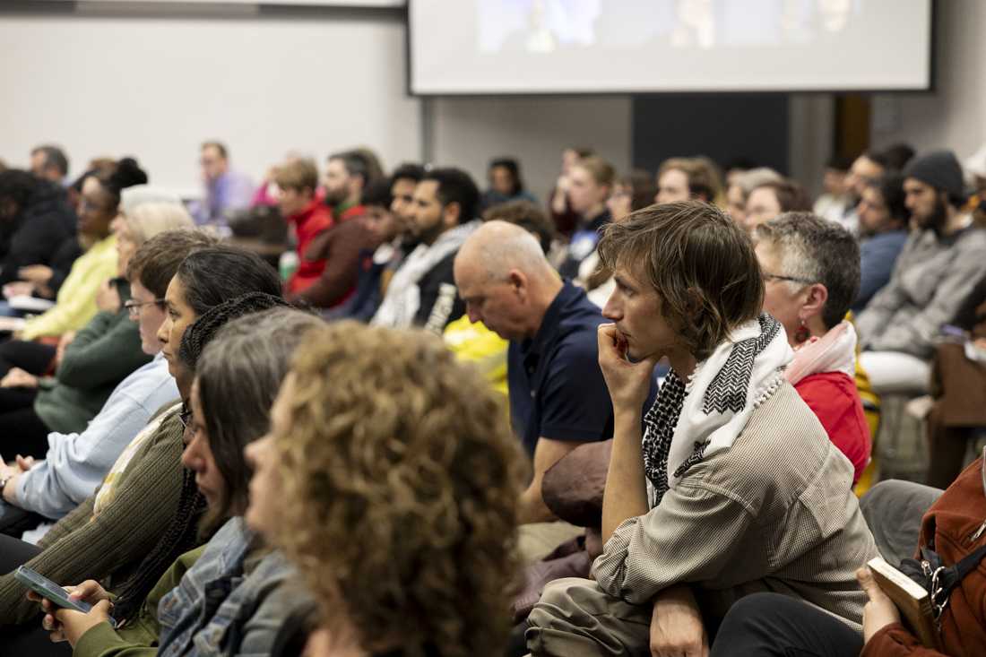 A person in the audience wearing a keffiyeh&#8212;a traditional Palestinian scarf, which has become a symbol of support for Palestine and its people&#8212;listens during the public comments section of the meeting. People attended the April 3, 2024 Eugene 4J School Board meeting showing their support for Spencer Butte Middle School math teacher Jenoge Sora Khatter, who was directed to remove a Palestinian flag from his classroom by a district administrator, or face consequences up to and including termination. (Alex Hernandez/Emerald)