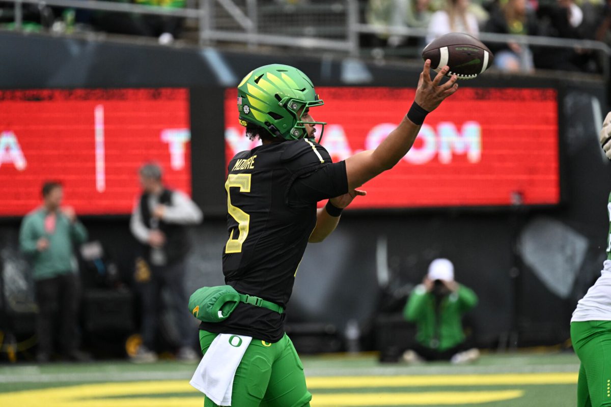 Dante Moore throws a pass during the Spring Game in Autzen Stadium.&#160;The "Green Team" wins 28-17 during the Oregon Ducks Spring Game in Autzen Stadium on April 27, 2024. (Kai Kanzer/Emerald)