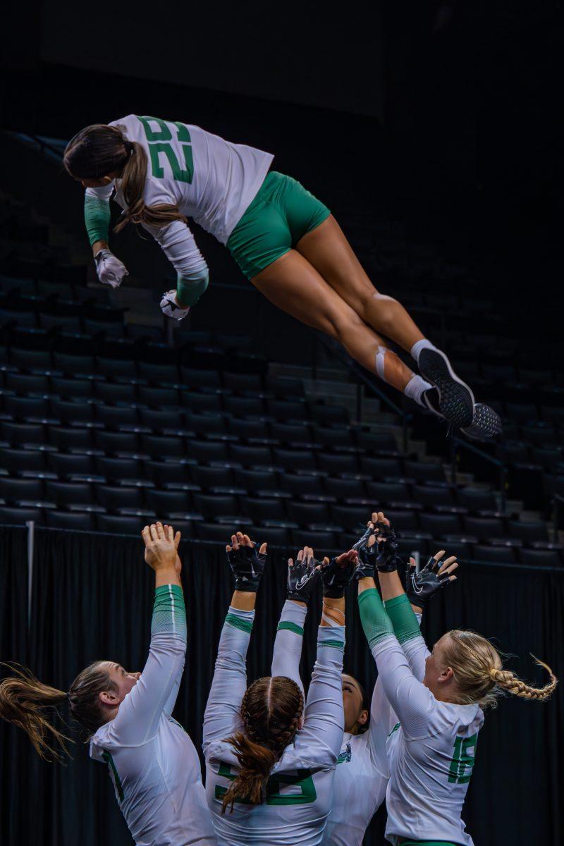 The University of Oregon Ducks Acrobatics and Tumbling Team played the University of Baylor Bears in a home match at Matthew Knight Arena in Eugene, Ore., on Apr. 5, 2024. (Spencer So/Emerald)