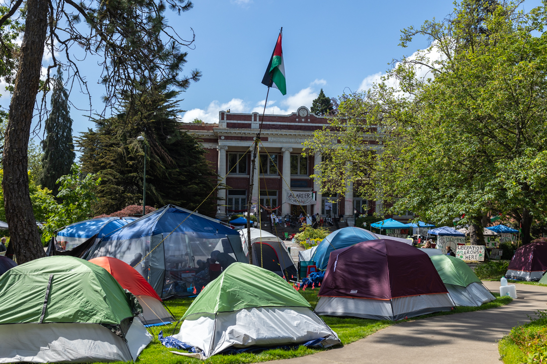 Many tents sit across the street from Johnson Hall. The University of Oregon&#8217;s pro-Palestine encampment enters its fourth week. (Molly McPherson/Emerald)