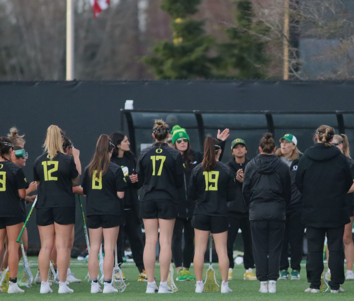 Head Coach, Jessica Drummond holds a discussion during a timeout. The Oregon Women&#8217;s Lacrosse team walks away with a win over Merrimack College 18-3 in their first game back from being on the road at Pap&#279; Field in Eugene, Ore., on March 6, 2024. (Alyssa Garcia/Emerald)