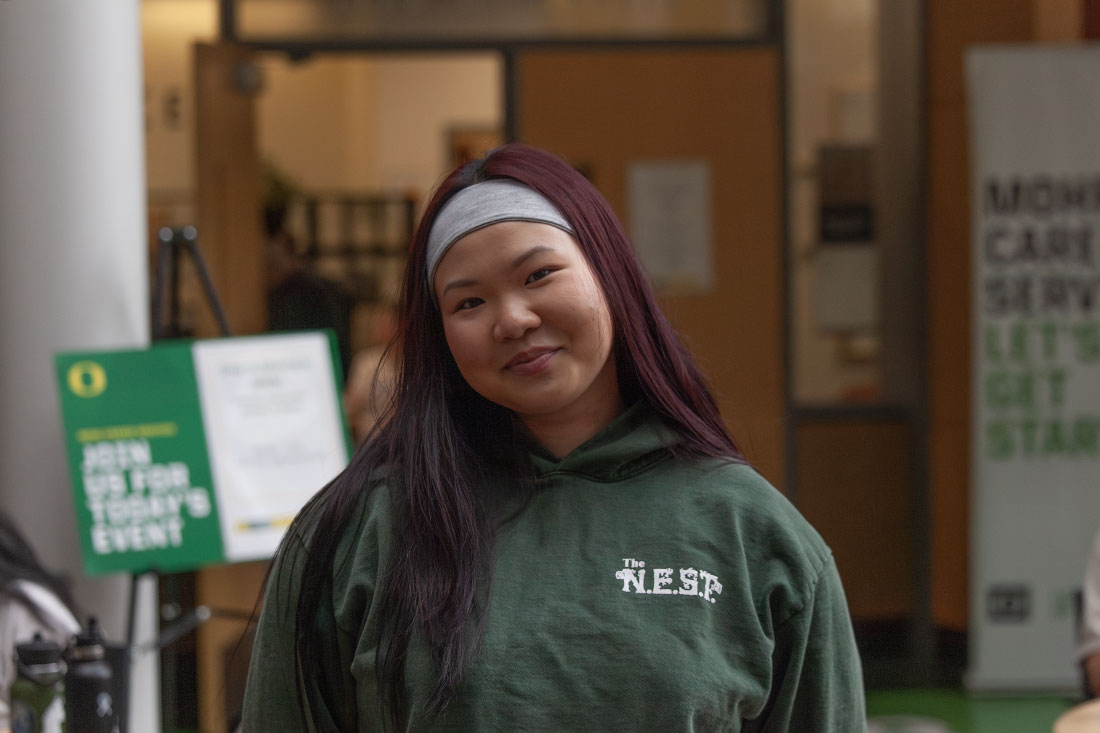 Audrey Huynh a graduating senior at the University of Oregon, poses for a picture in Lillis Hall. (Miles Cull/Emerald)