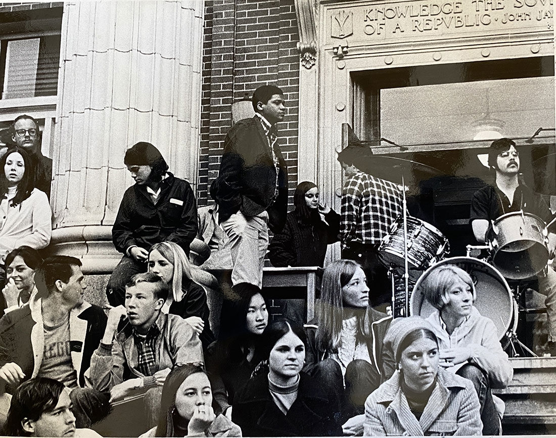 Anti Vietnam War protestors sit in on the steps of Johnson Hall. Complementary of Special Collections and University Archives, UA Ref 3 University Archives Photographs, Box 115 Folder “Student Activities - Protests”