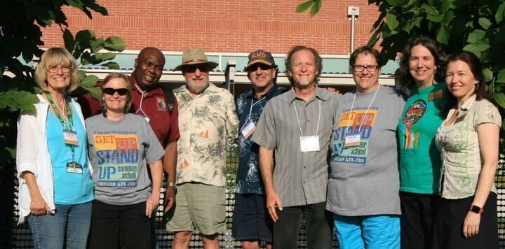 (Left to Right)&#160;Barbara Byrd, Leigh Roberts, Sherman Henry, Steven Hecker, Gordon Lafer, Bob Bussel, Sarah Laslett, Deb Mailander and Jennifer Smith. (Photo courtesy of Nikki Rudiger)